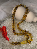 Handmade Baltic amber prayer beads tasbih – authentic Islamic misbaha for dhikr, meditation, and daily prayer.