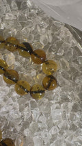 Elegant amber tasbih displayed for Islamic prayer and meditation – handmade misbaha collector’s gift.