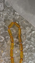 Elegant amber tasbih displayed for Islamic prayer and meditation – handmade misbaha collector’s gift.
